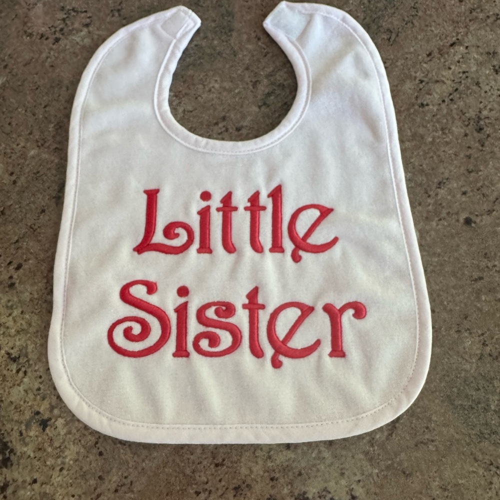 White Bib with Pink Little Sister' Embroidery
